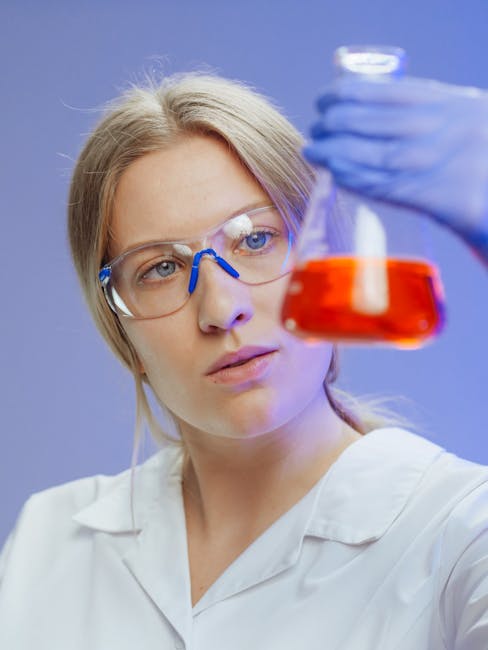 a photograph of a chemist wearing safety glasses