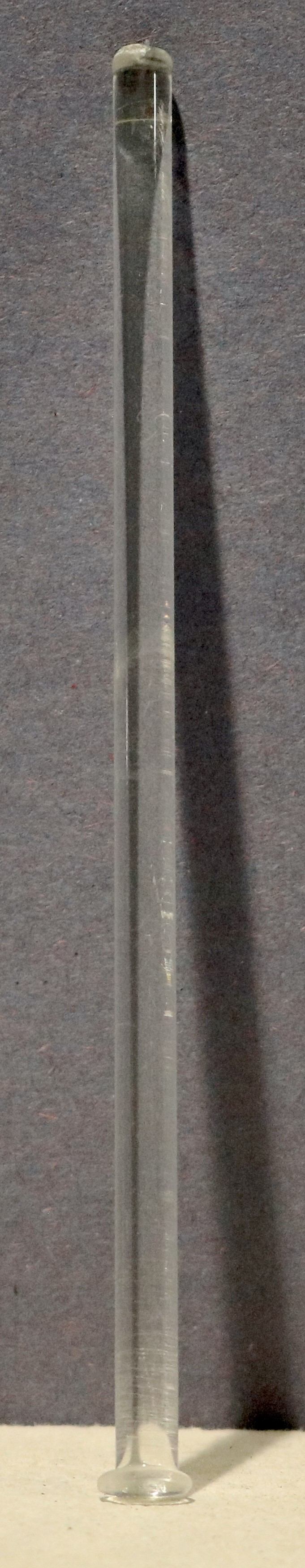 a photograph of a glass stirring rod