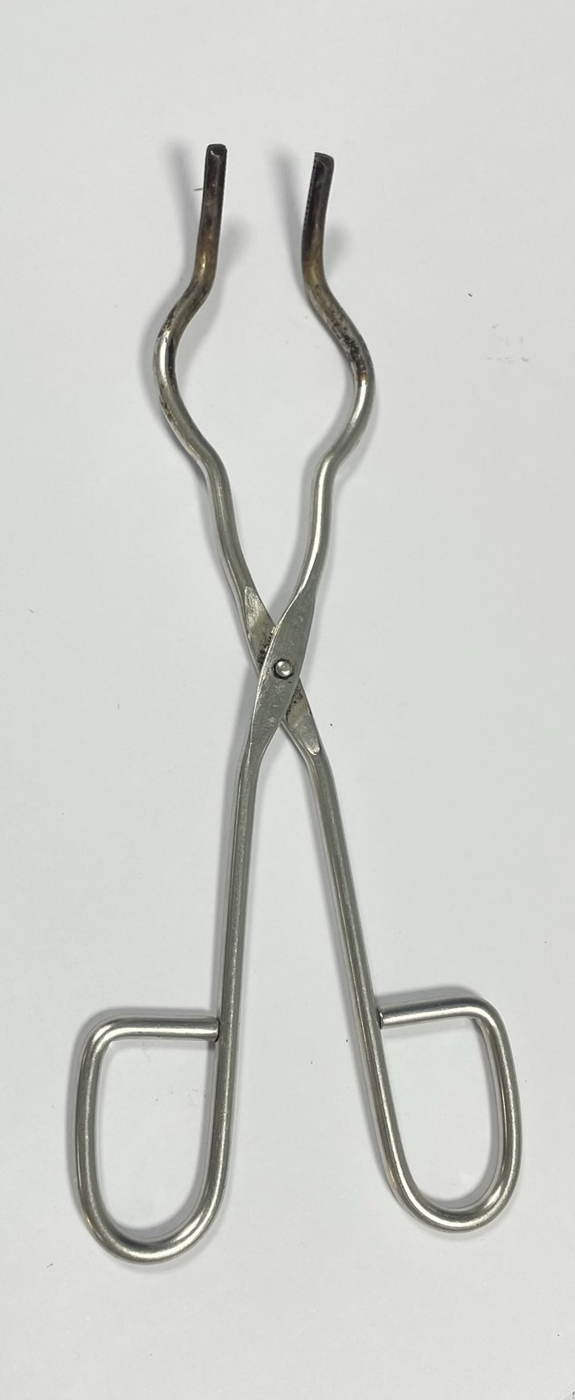 a photograph of a pair of tongs